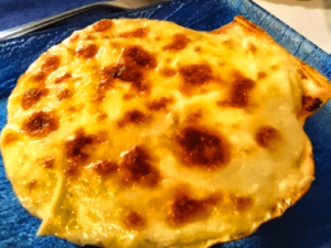 Vieira rellena de merluza y gambas